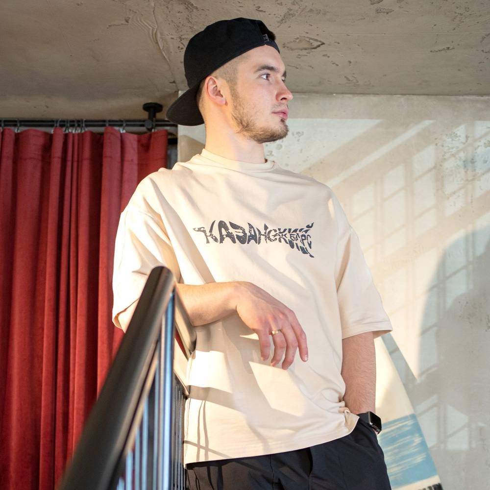 Ak Bars drop 1 — model in a black club hoodie