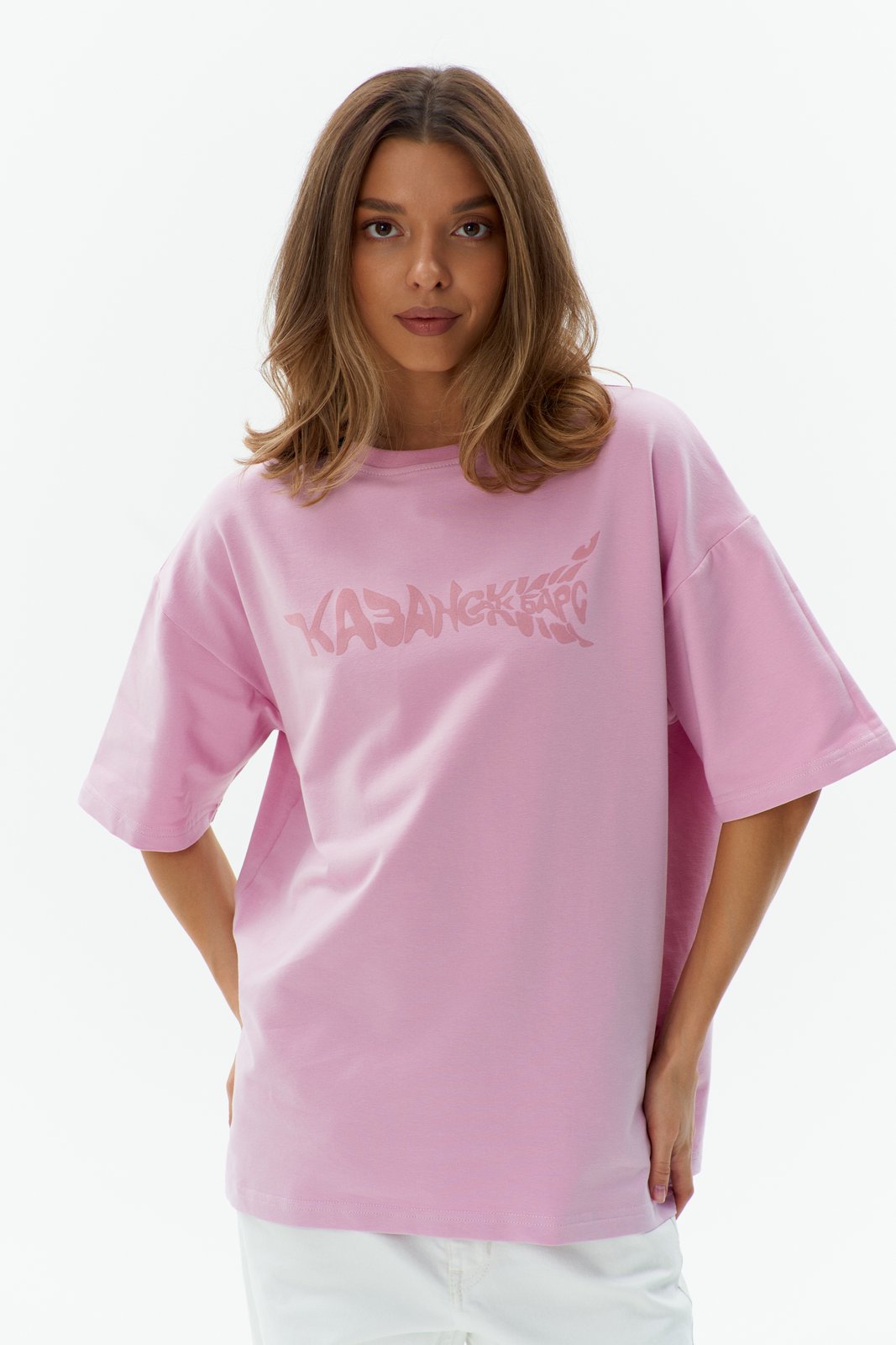 Ak Bars drop 2 — studio product shot of a woman in a pink tee