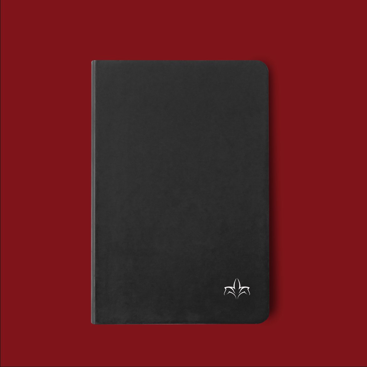 Black branded notebook with the embossed tulip logo on a deep-red ground